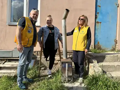Con una beneficiaria delle stufe WICTU